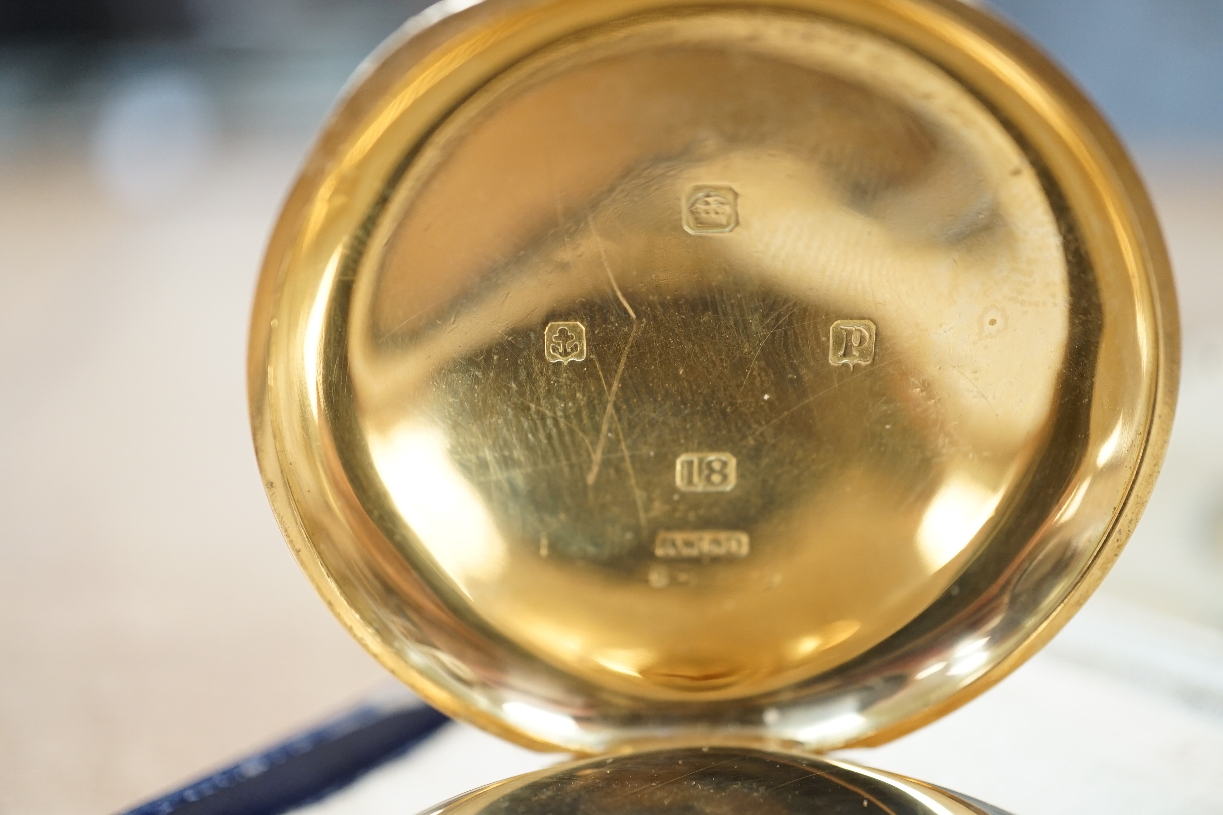 A George V 18ct gold Waltham open faced keyless pocket watch, with Arabic dial and subsidiary seconds, case diameter 50mm, gross weight 98.9 grams.